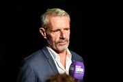 <span style='display:inline-block; background-color:#DF071E; width: 100%;padding:5px;'>Lambert Wilson</span>