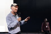 <span style='display:inline-block; background-color:#DF071E; width: 100%;padding:5px;'>Paul Laverty</span>