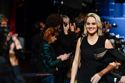 <span style='display:inline-block; background-color:#DF071E; width: 100%;padding:5px;'>Noémie Merlant</span>