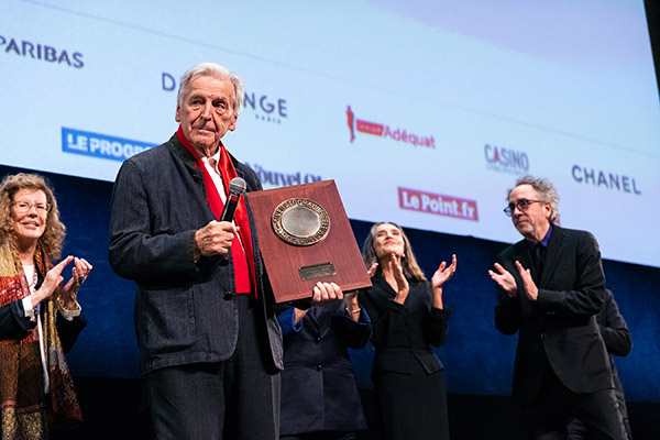 <span style='display:inline-block; background-color:#DF071E; width: 100%;padding:5px;'>Costa-Gavras</span>
